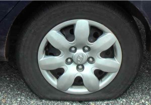 On the road with hypnosis! Flat tire.